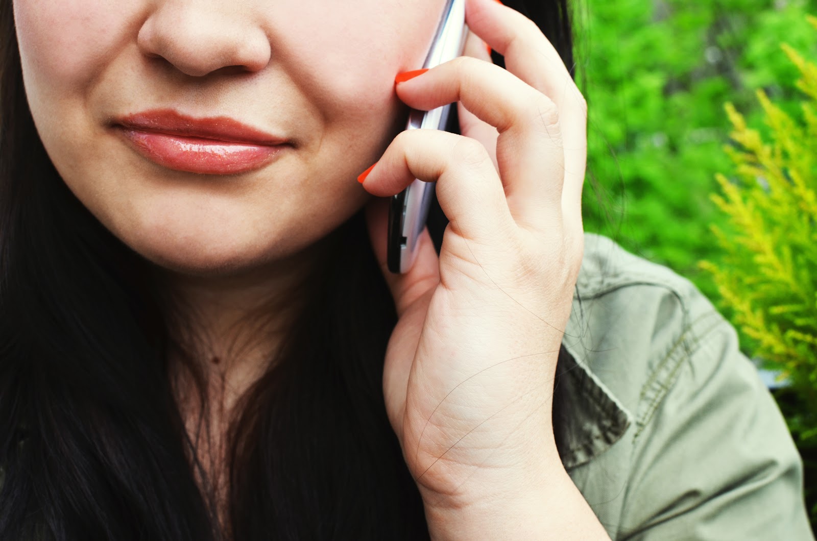 person woman smartphone calling